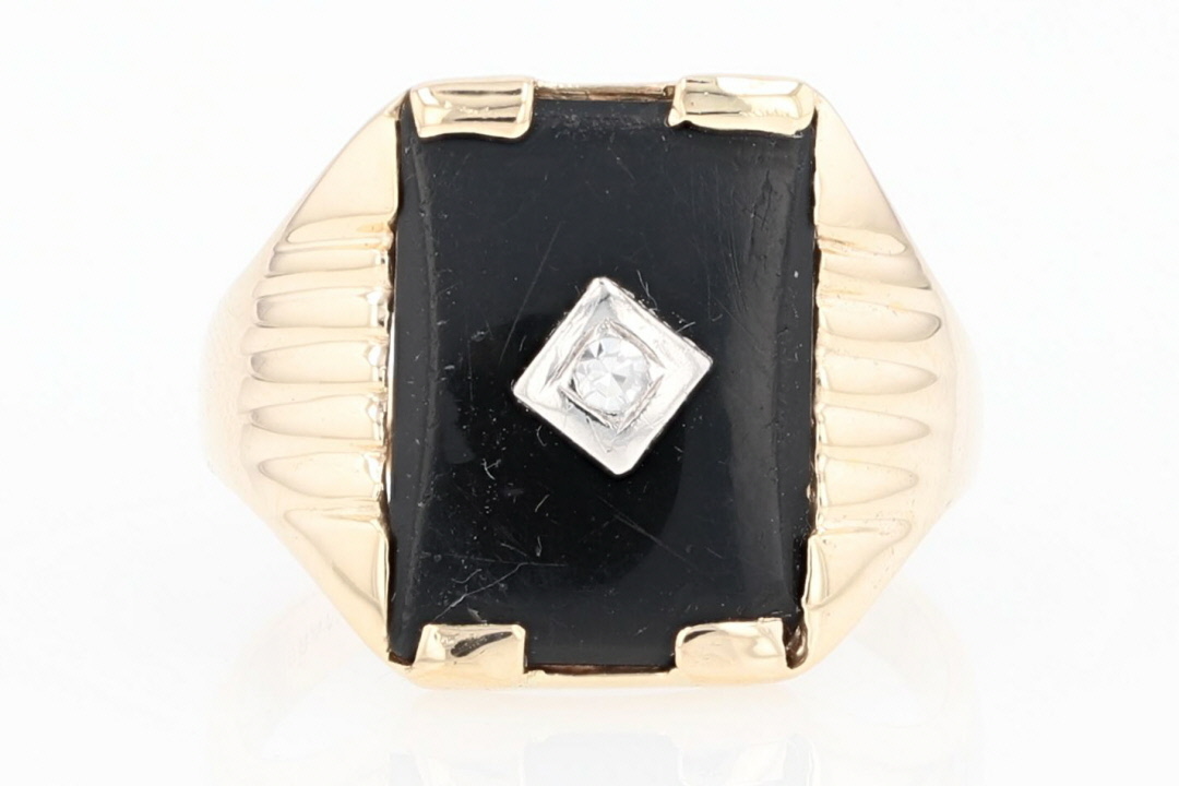 Store 10kt Onyx and diamond statement ring