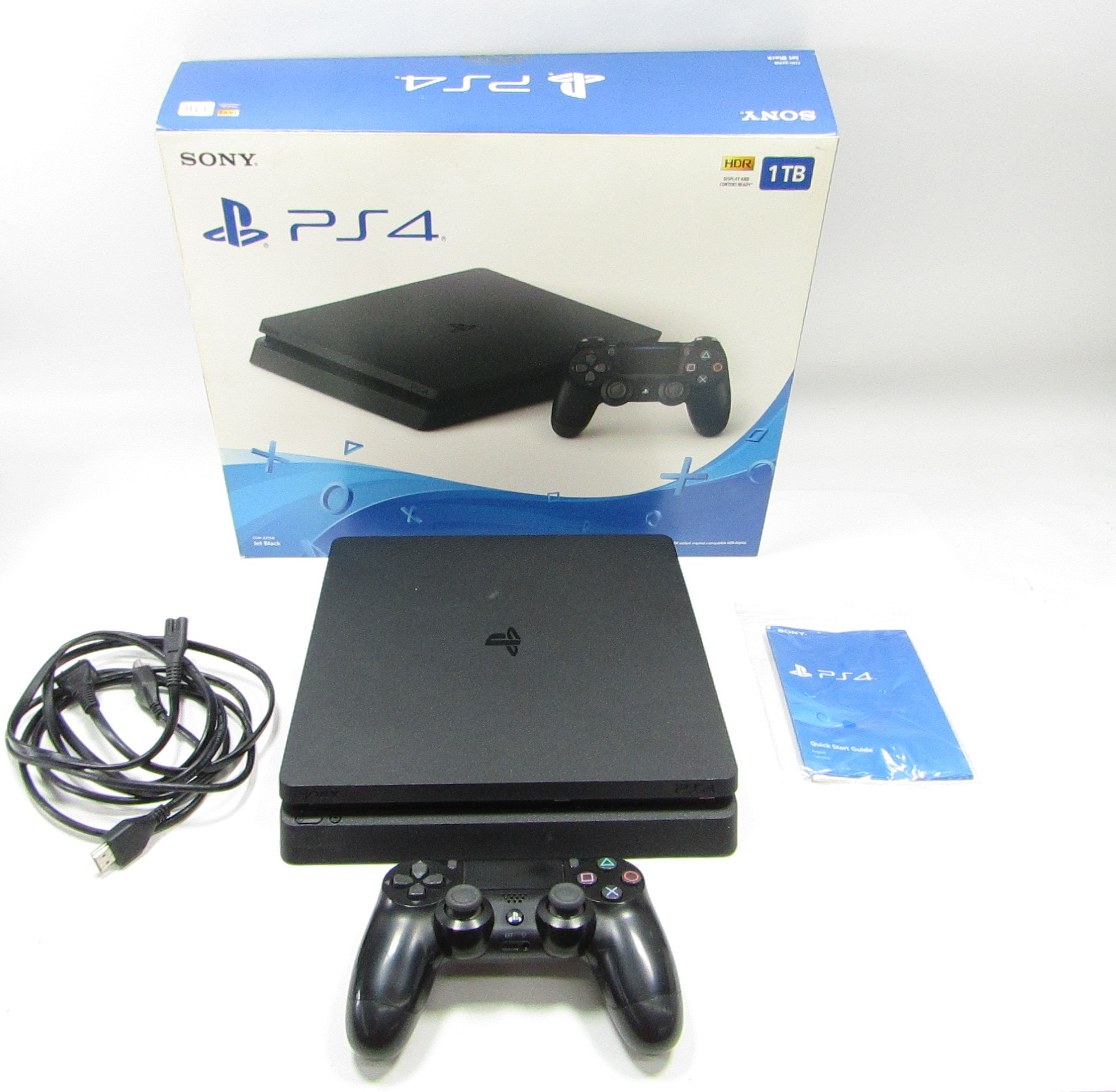 Playstation 4 Slim 1Tb + 1 Joy + 4 Juegos :: Chaia Electrodomésticos