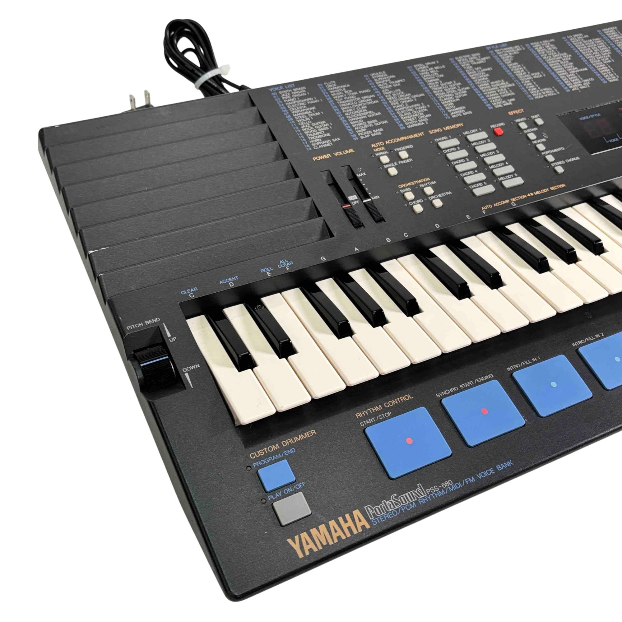 Yamaha PortaSound PSS-680 61-Key Digital Keyboard Music