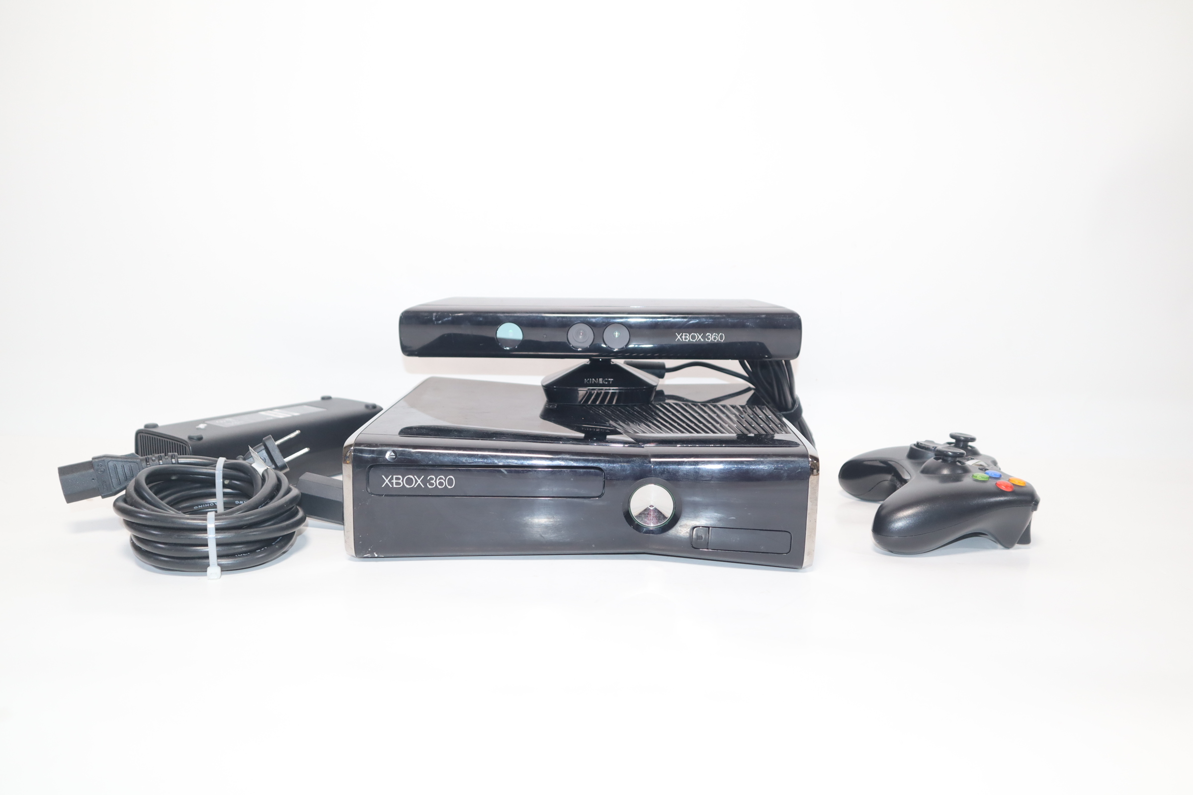 A Close-up Front View of the Used Lying XBOX 360 Slim Corona 250GB Console  and Two Gamepads Editorial Stock Image - Image of gaming, view: 213836204