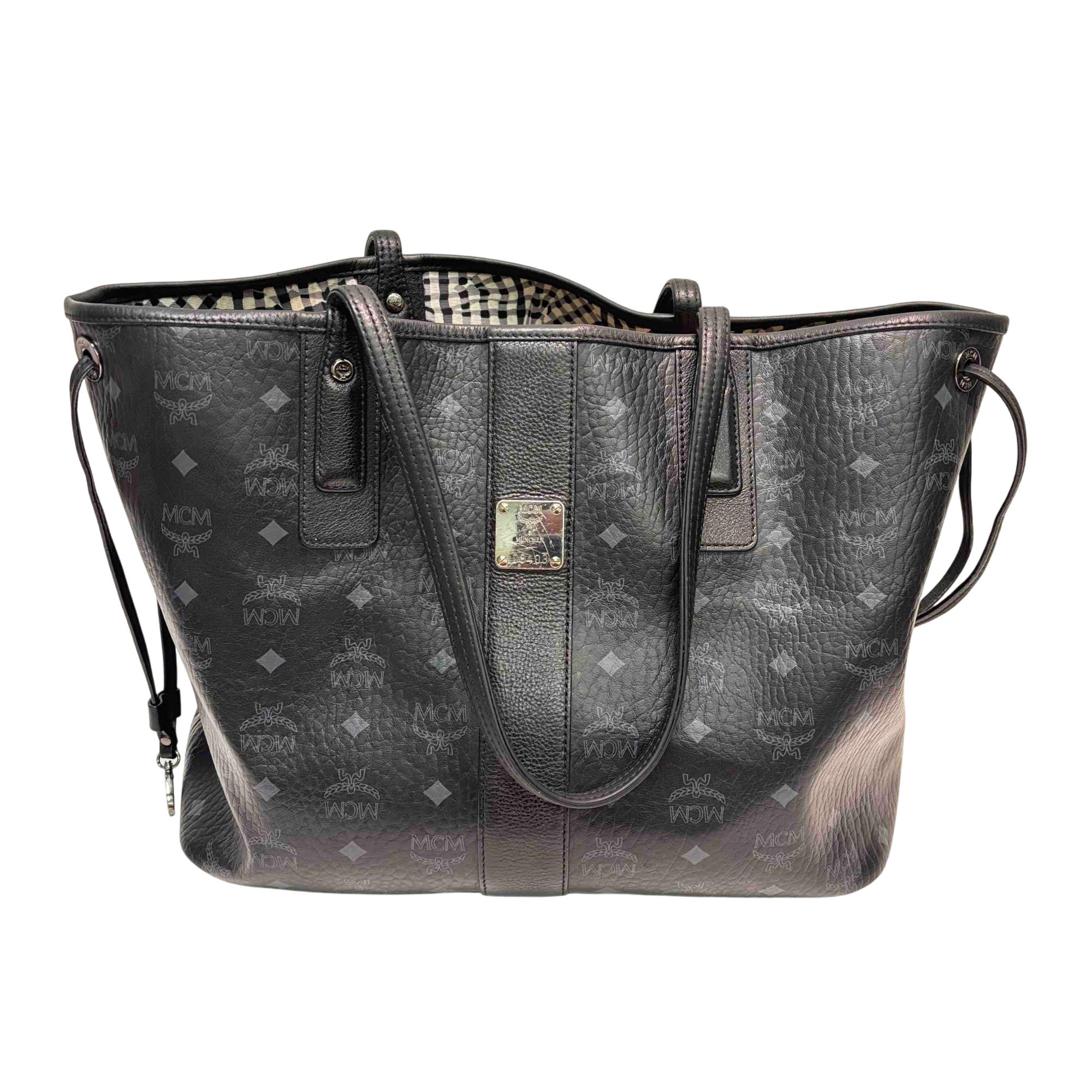 Black MCM Monogram Drawstring Pouch Shoulder Bag Buy MCM Black Medium Dessau Drawstring Bag in Embossed  main image 2