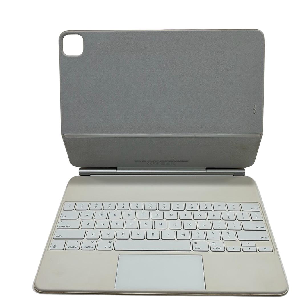 space grey ipad with white magic keyboard