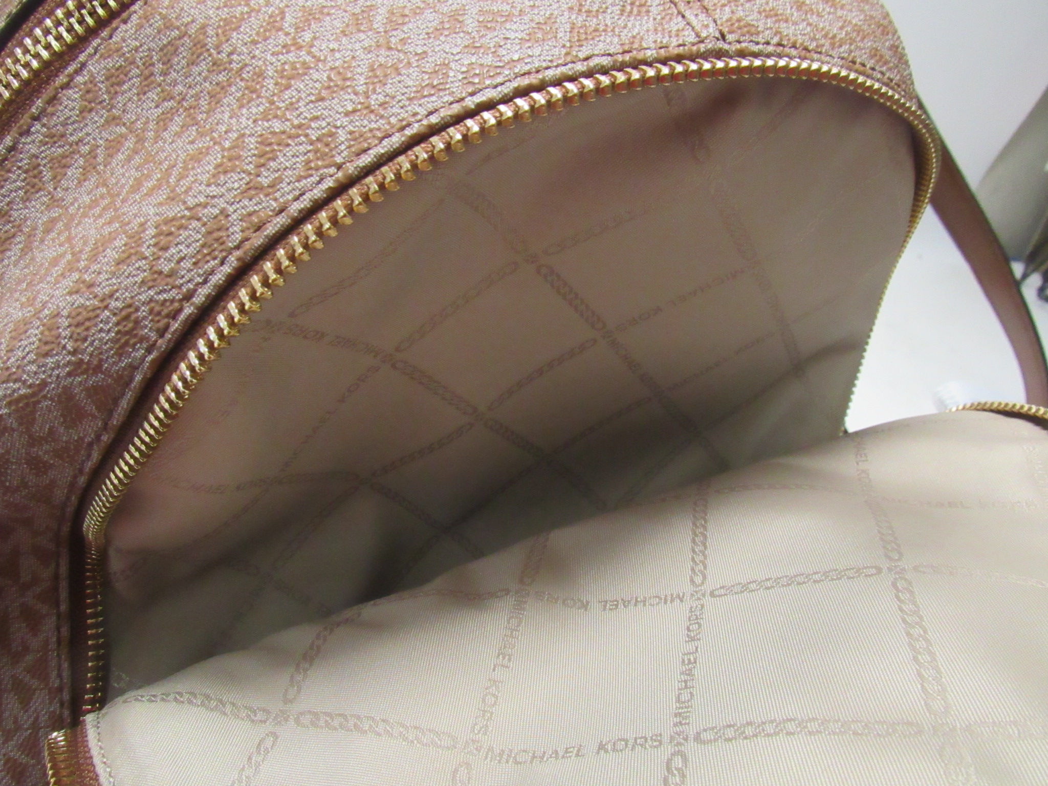 Michael Kors Multi-Color Brown/White/Tan Zip-Up MK Pattern Logo Backpack