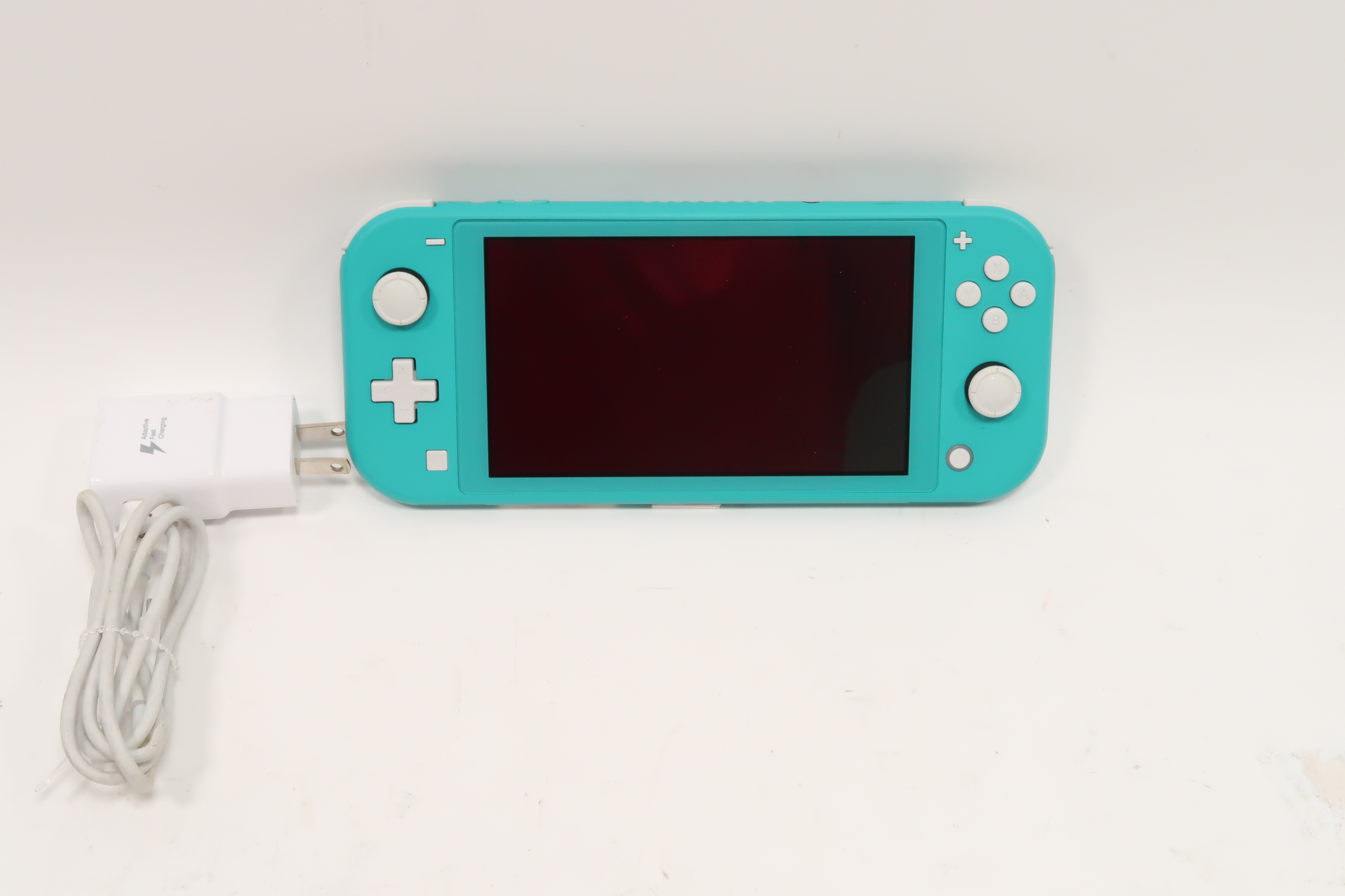 Nintendo Switch Lite in hotsell Turquoise tested works (NO CHARGER)