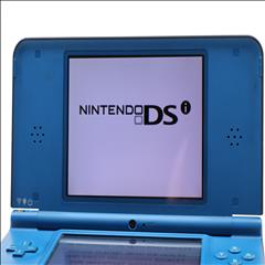 Nintendo DSi XL UTL-001 Dual-Screen Handheld Video Game