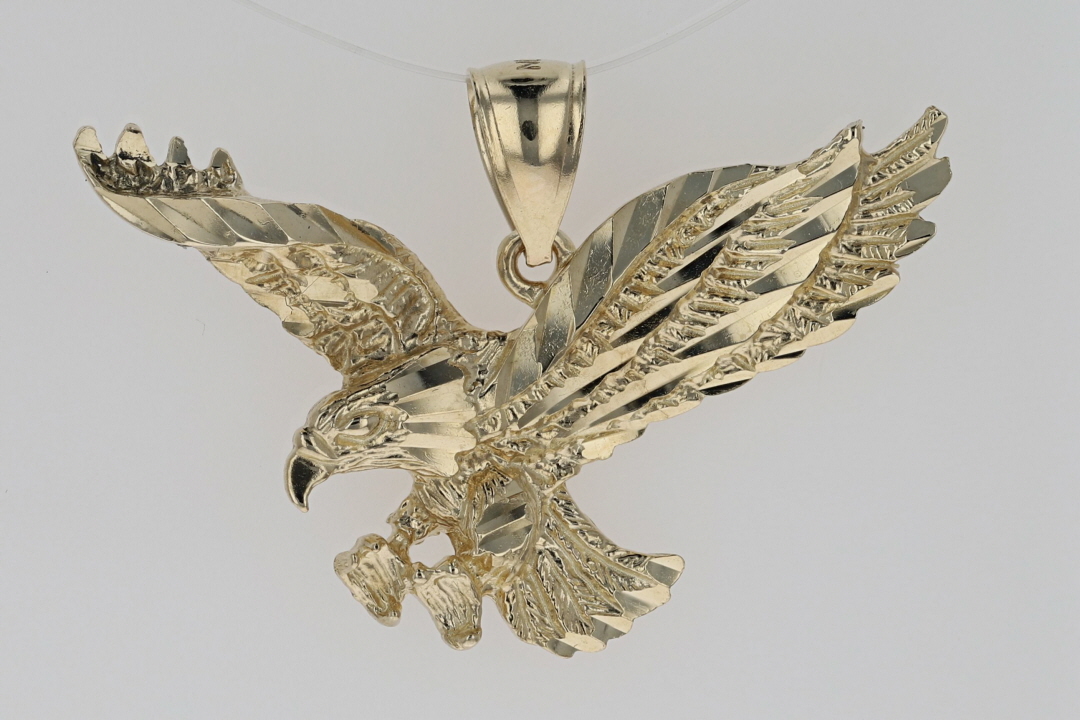 Gold on sale hawk pendant