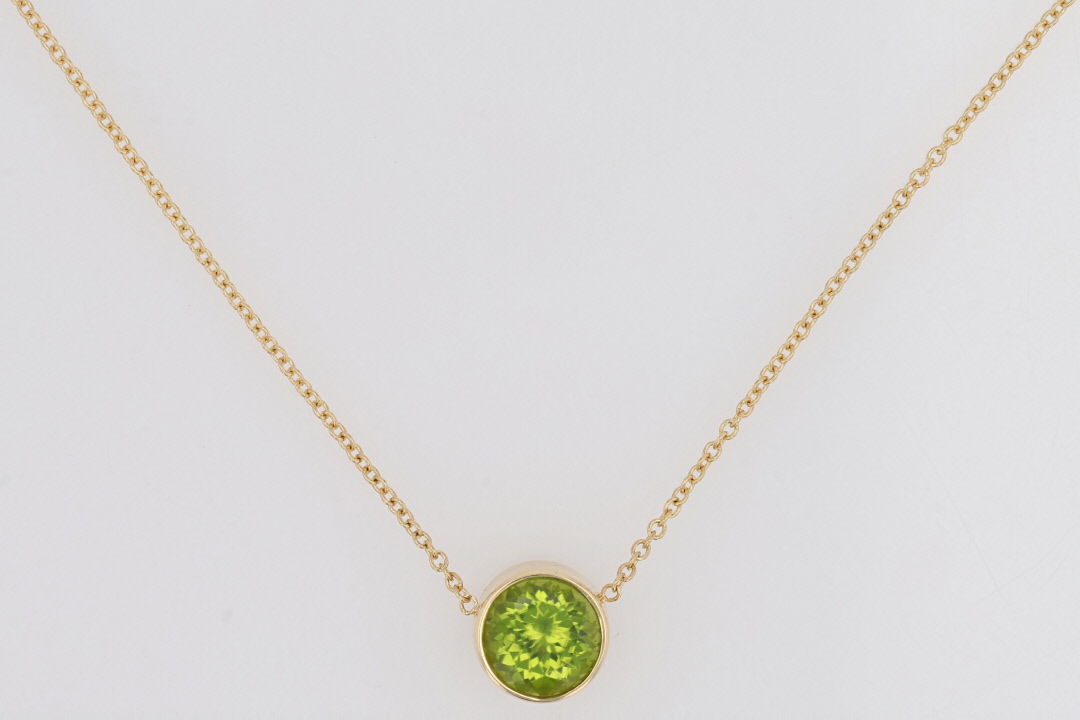 Peridot Bezel Set Dress Ring in 9ct Yellow Gold main image 0